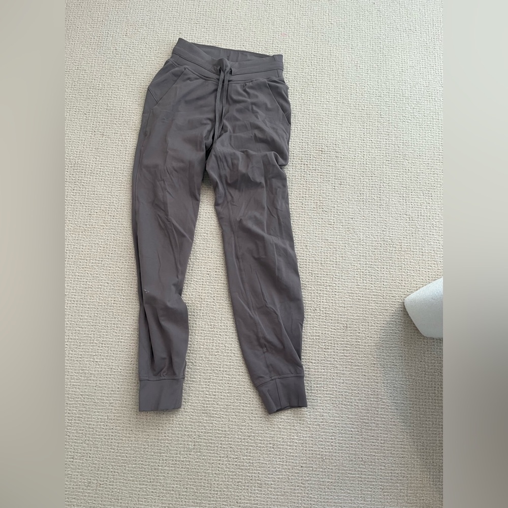 Light purple ish kinda brown lululemon joggers.